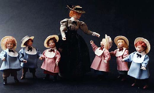 Young children with the school mistress